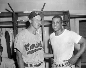 Willie Mays and Stan Musial Standing in Locker Room